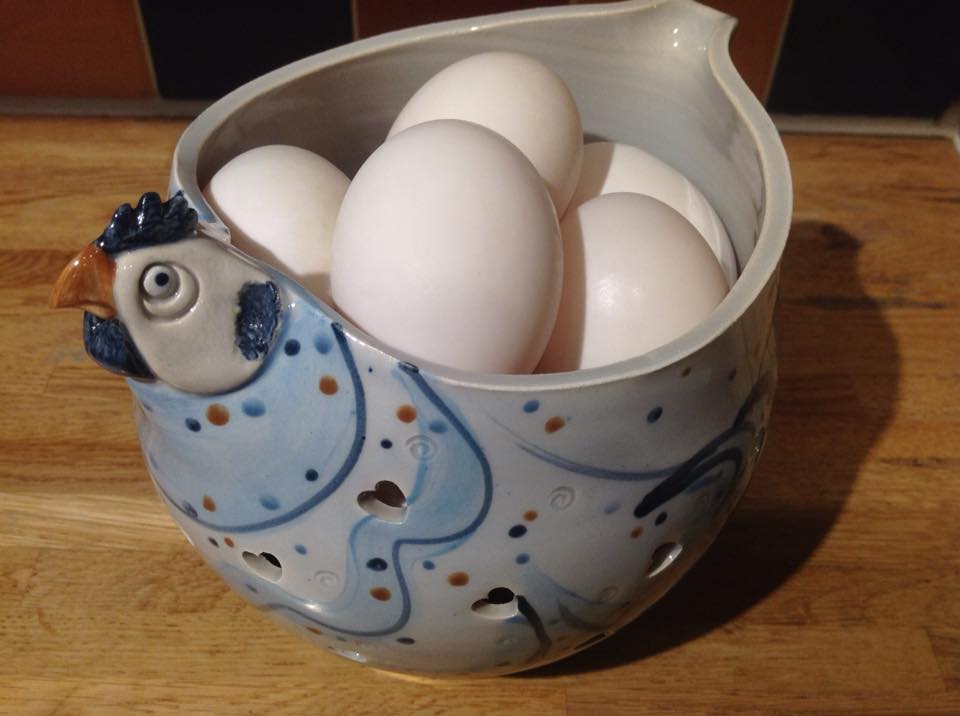 Image of a pottery hen basket