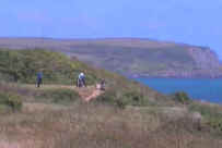 Playing golf by the sea